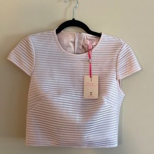 TB Cropped ZIP Top. Purchased in Dubai - new